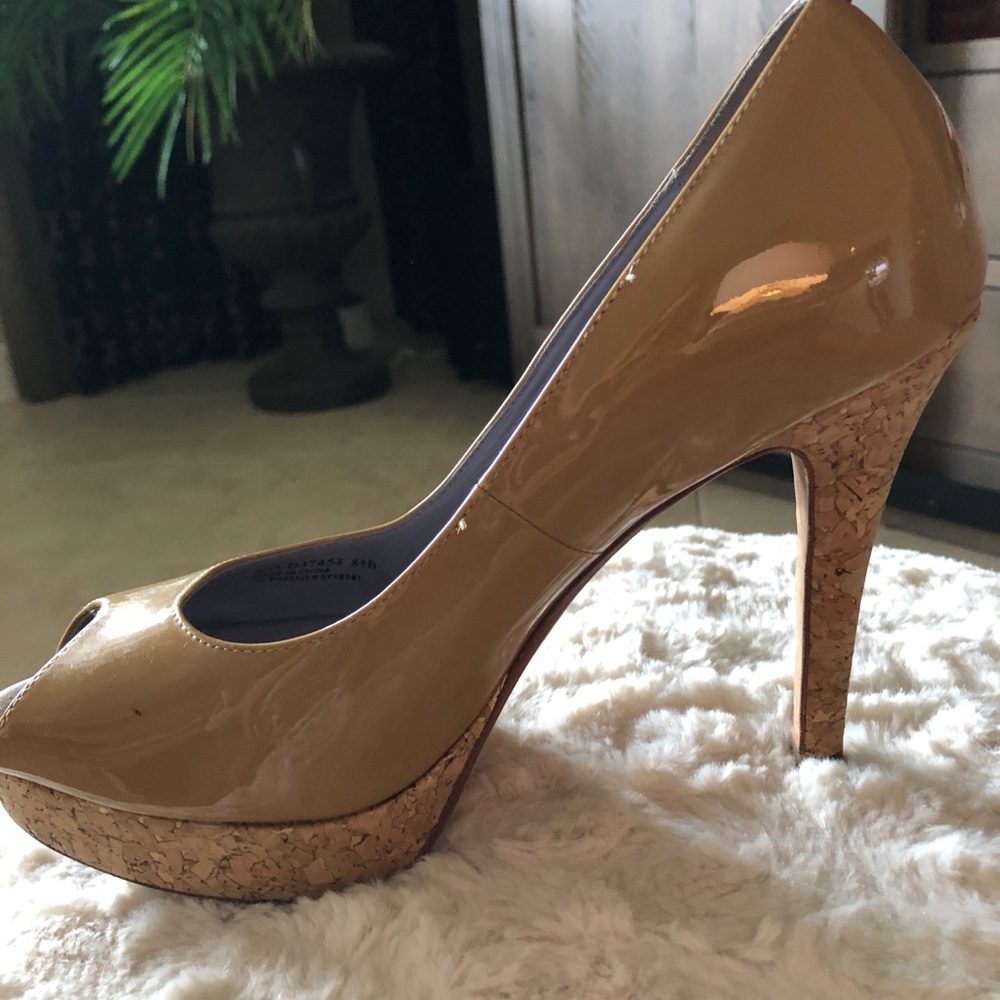 Nude peep toe pumps